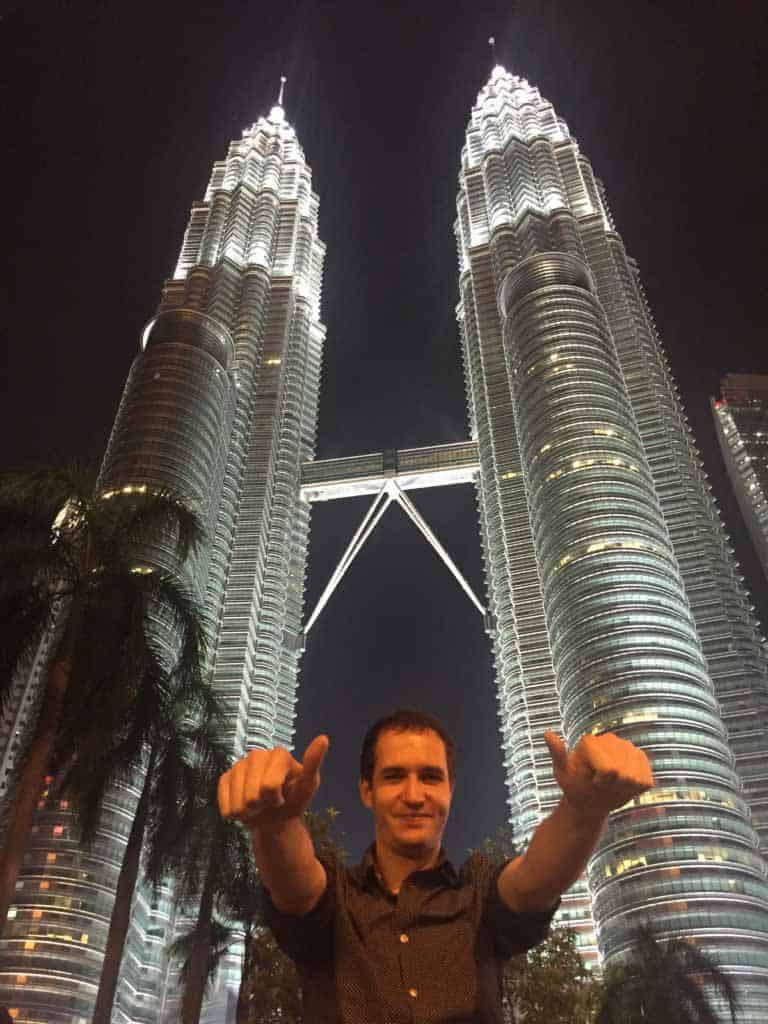 Petr, NEXT Academy's graduate in front of Petronas twin towers at Kuala Lumpur, Malaysia